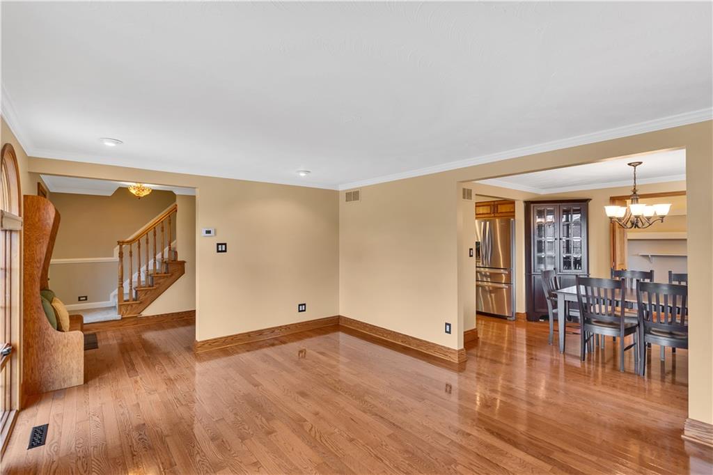 210 Gotham Lane Monroeville, PA 15146 - Photo 6 of 31 a view of a livingroom with furniture and a floor to ceiling window