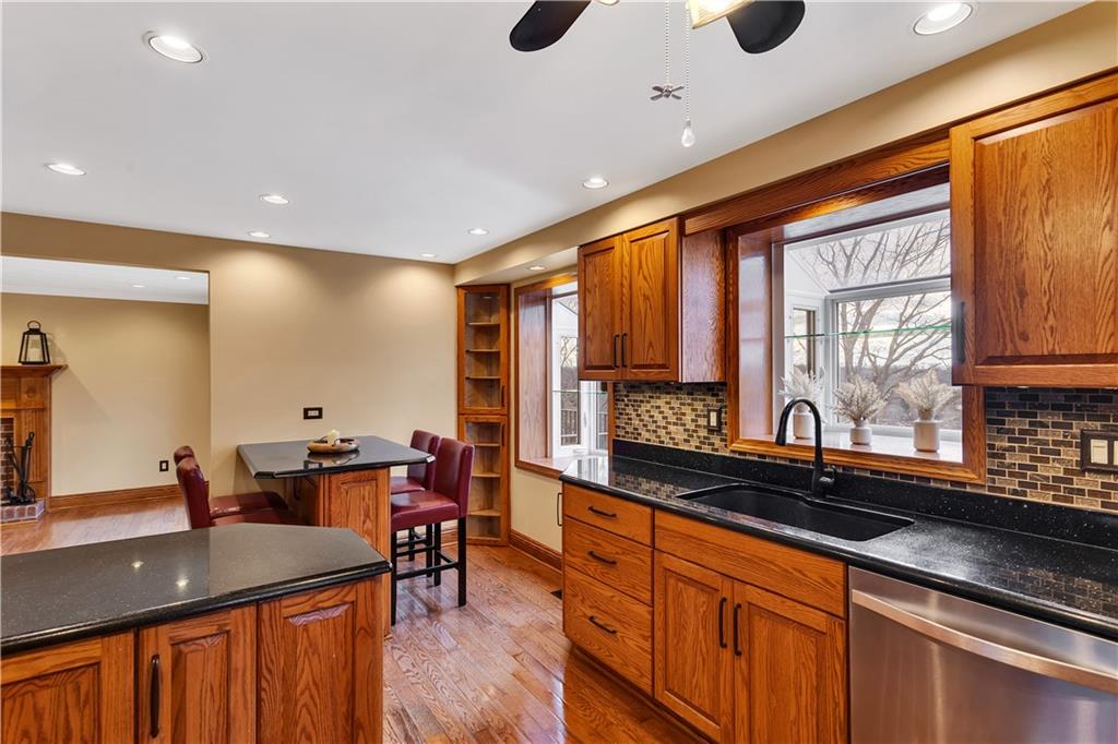 210 Gotham Lane Monroeville, PA 15146 - Photo 10 of 31 a kitchen with stainless steel appliances granite countertop sink stove and cabinets