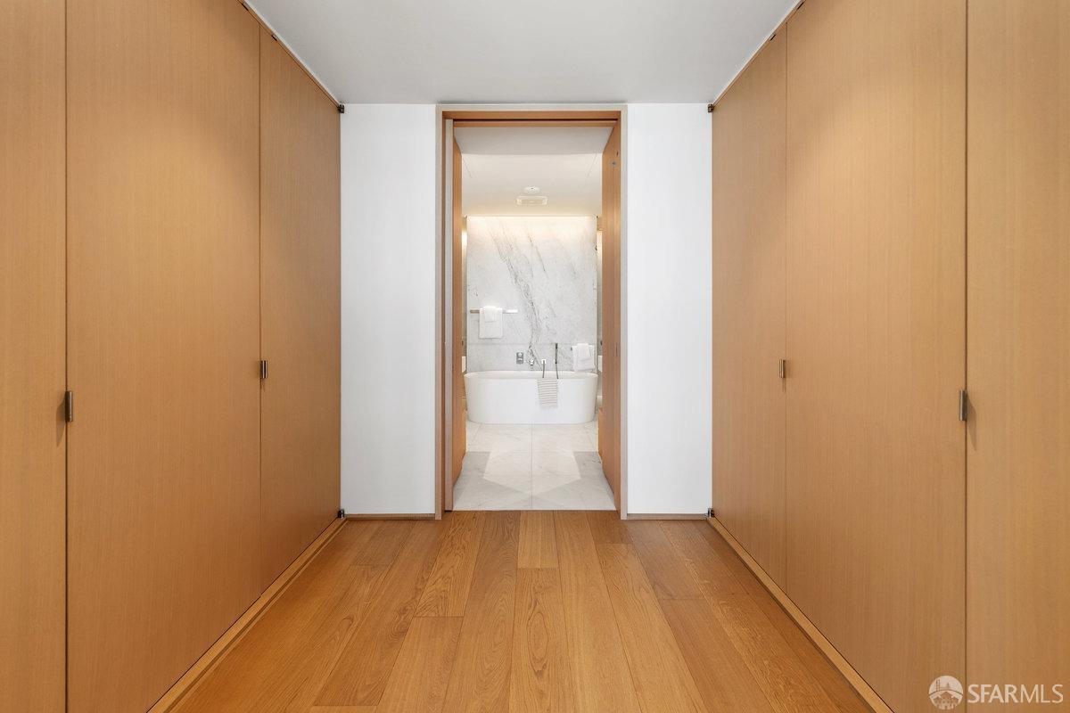 1 Steuart Lane, Unit 1001 San Francisco, CA 94105 - Photo 30 of 60 a view of an empty room with wooden floor and a window