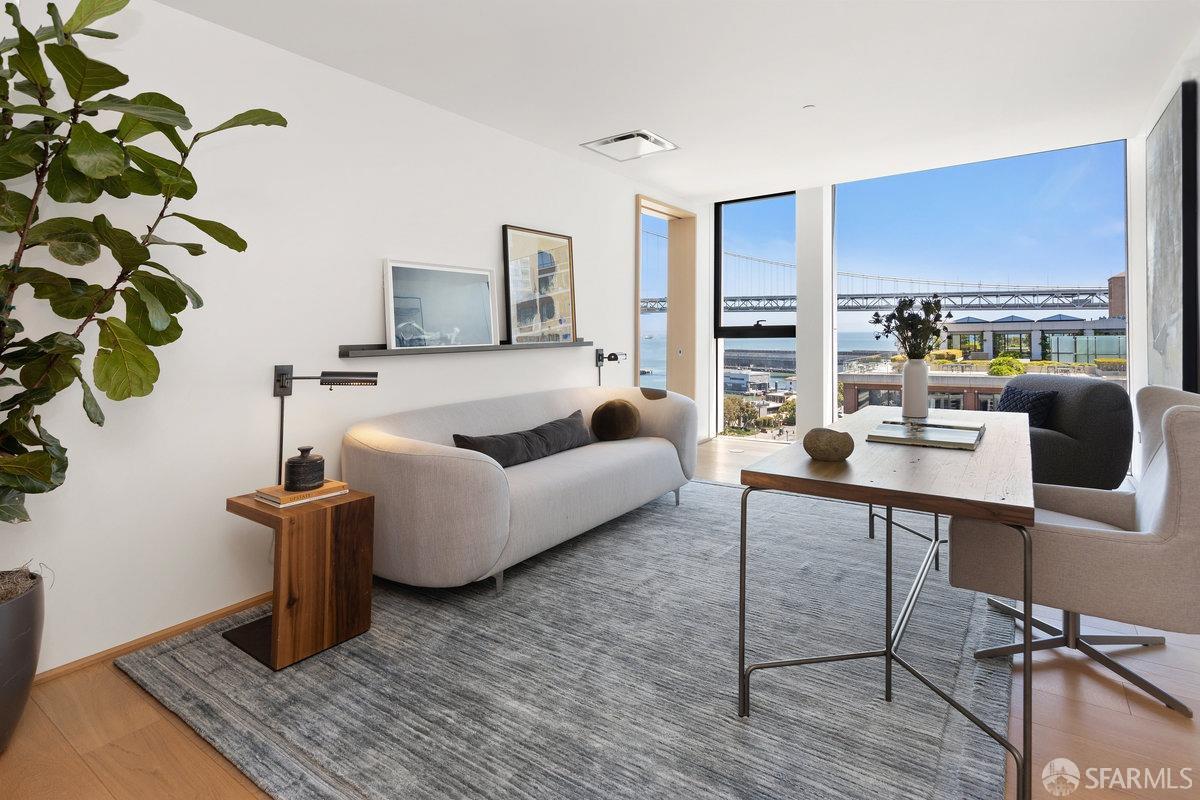 1 Steuart Lane, Unit 1001 San Francisco, CA 94105 - Photo 37 of 60 a living room with furniture and a wooden floor