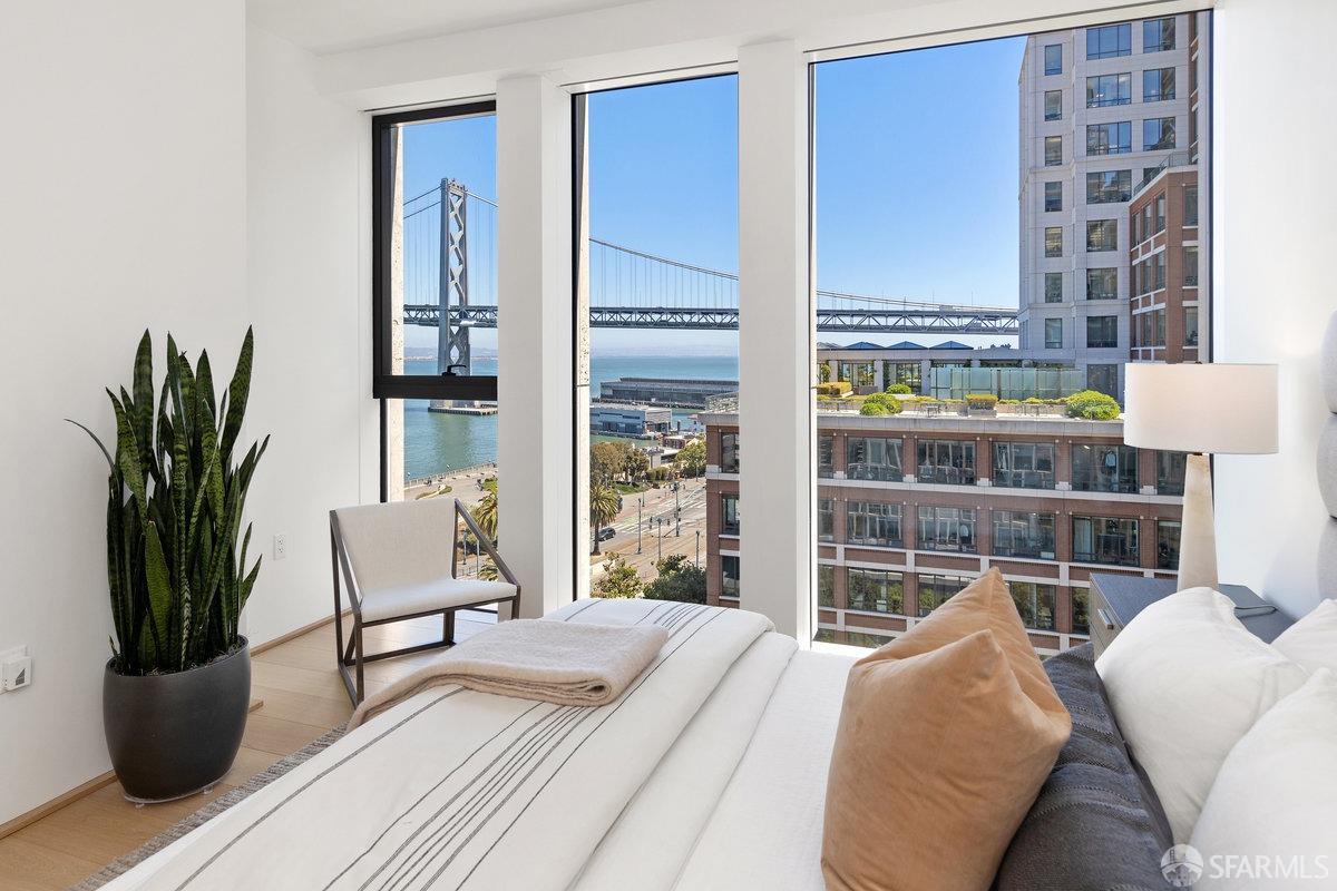 1 Steuart Lane, Unit 1001 San Francisco, CA 94105 - Photo 41 of 60 a bedroom with furniture and a potted plant