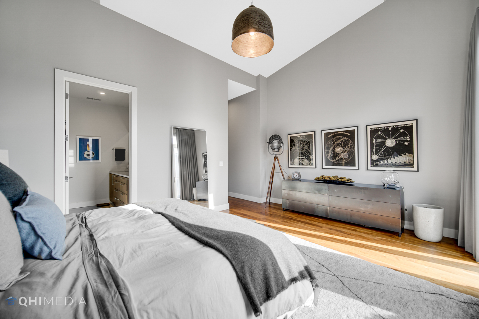 16 North Carpenter Street, Unit PHN Chicago, IL 60607 - Photo 11 of 25 a bedroom with a bed and painting on the wall