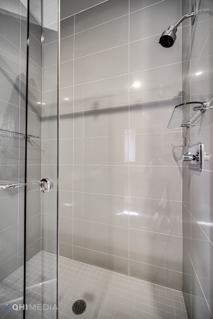 16 North Carpenter Street, Unit PHN Chicago, IL 60607 - Photo 13 of 25 a bathroom with a shower