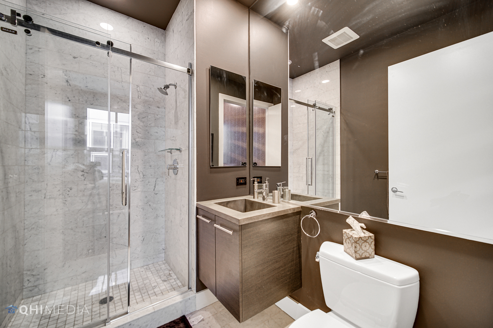 16 North Carpenter Street, Unit PHN Chicago, IL 60607 - Photo 17 of 25 a bathroom with a sink and a mirror