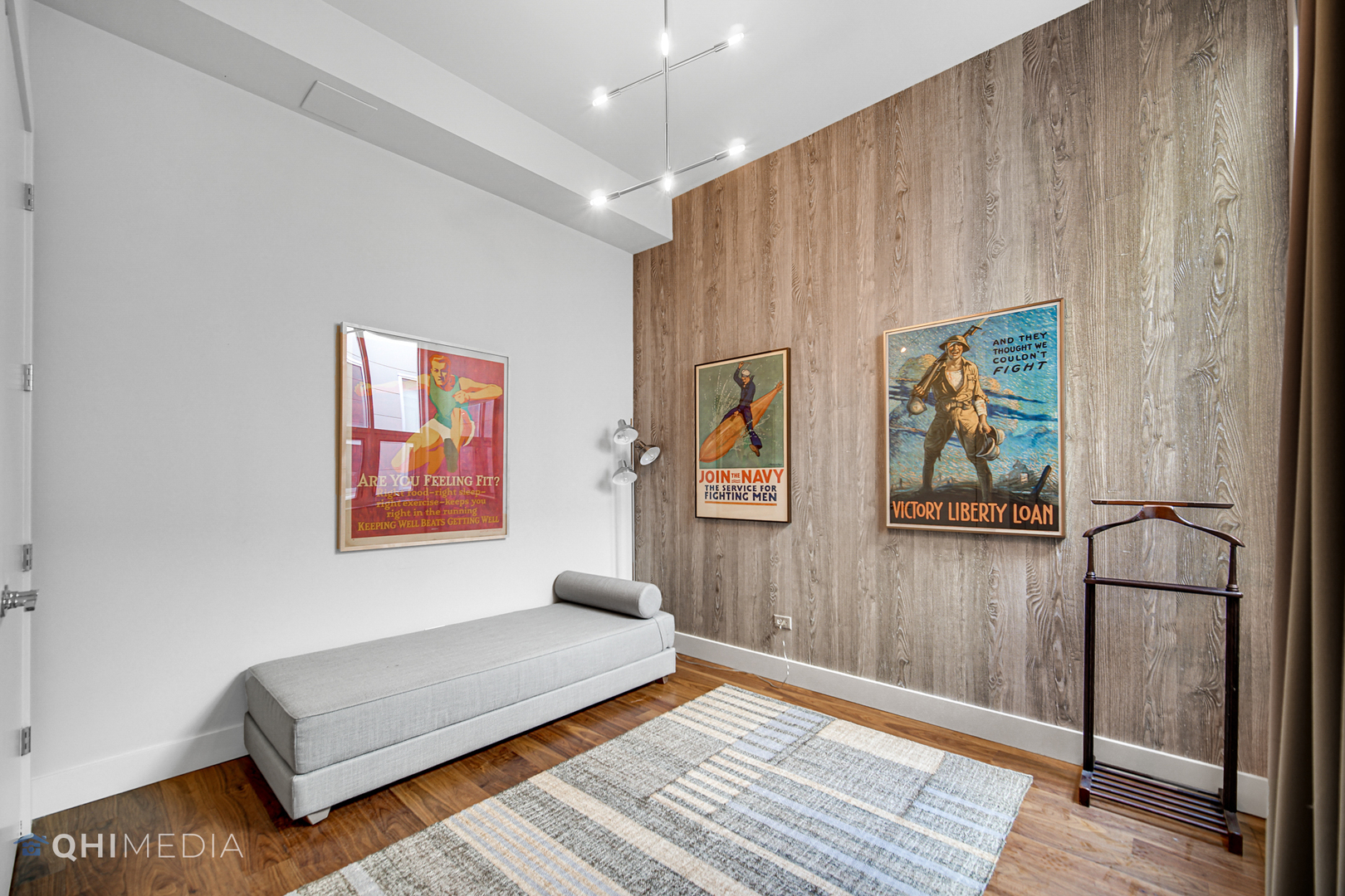 16 North Carpenter Street, Unit PHN Chicago, IL 60607 - Photo 18 of 25 a bedroom with a bed and a painting on the wall