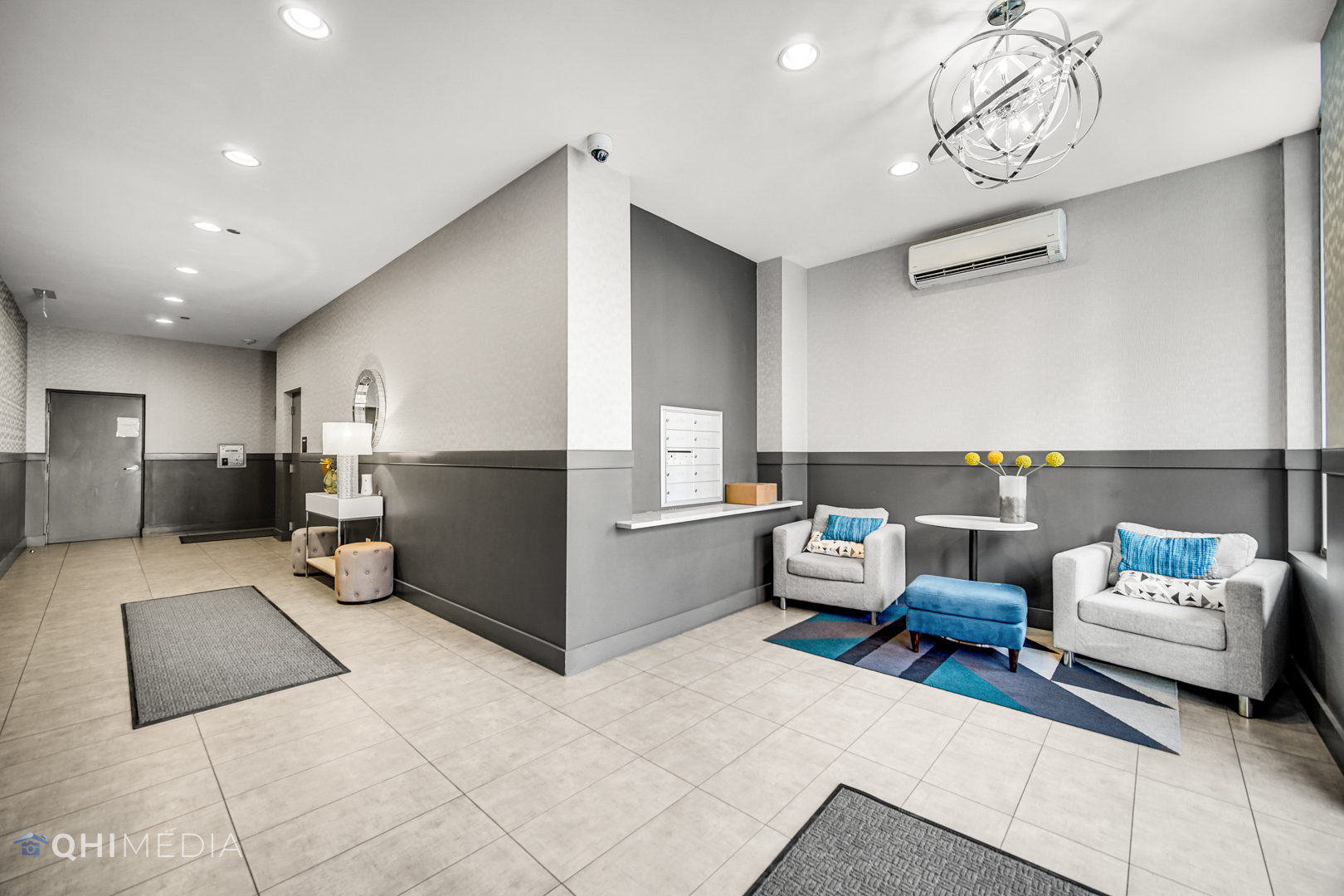 16 North Carpenter Street, Unit PHN Chicago, IL 60607 - Photo 25 of 25 a living room with furniture and a chandelier