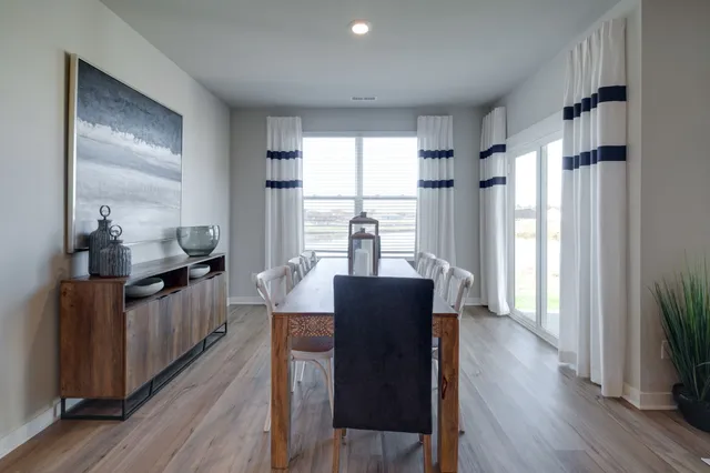 a view of kitchen with sink and wooden floor