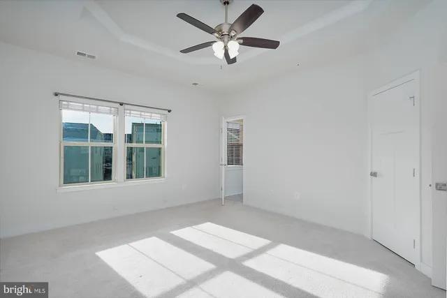 a bedroom with a bathroom