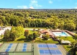 a view of a pool with a yard