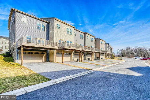 a view of a brick building from a balcony
