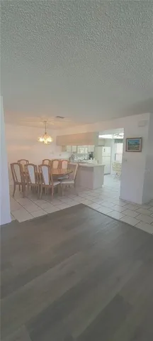 a kitchen with a sink a stove and refrigerator