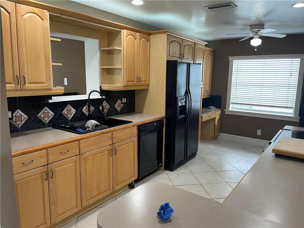 22813 Southwest 54th Way Boca Raton, FL 33433 - Photo 3 of 10 a kitchen with a sink and cabinets