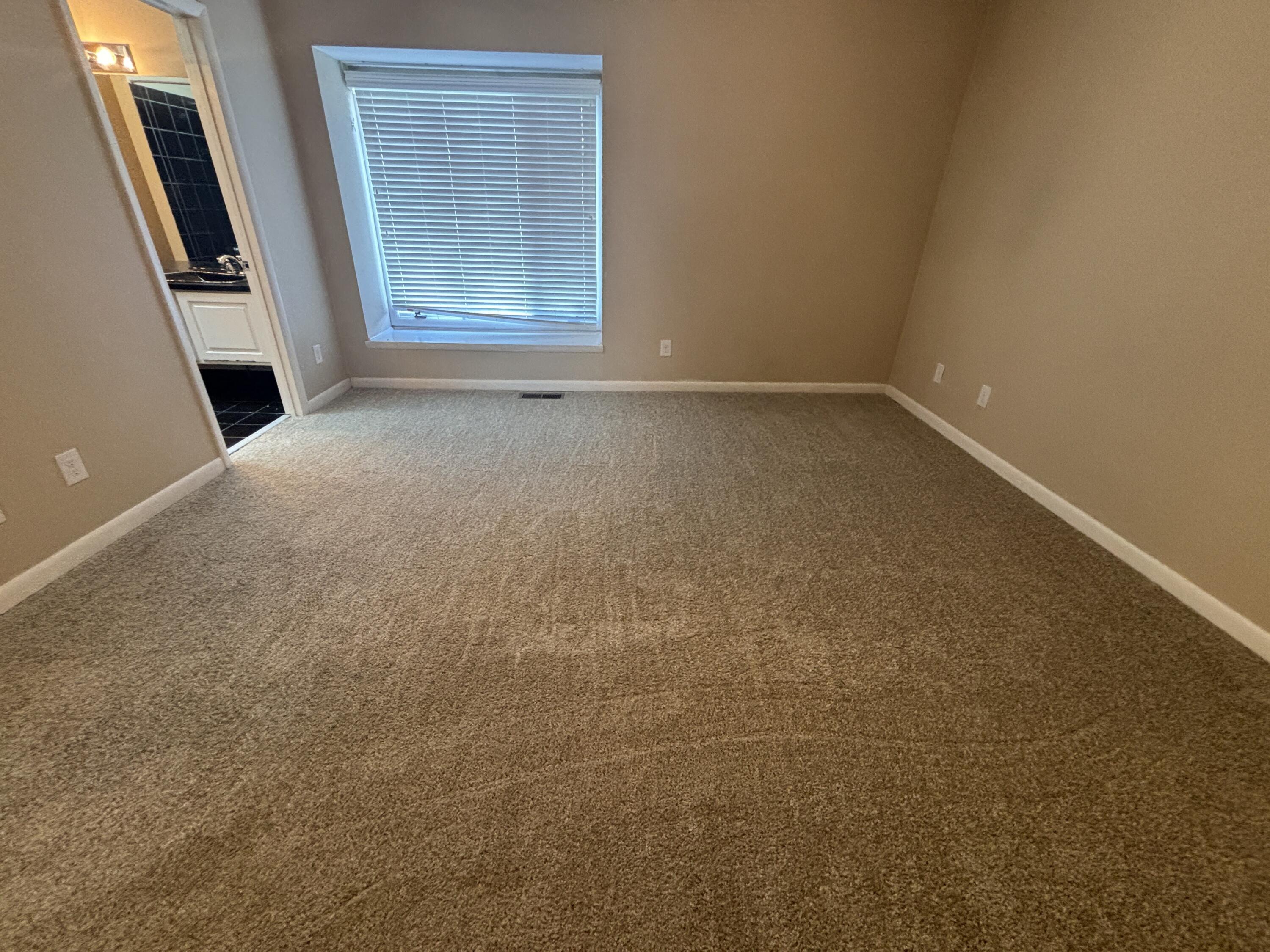 4978 Hunting Hills Circle Roanoke, VA 24018 - Photo 10 of 24 a view of an empty room with a window