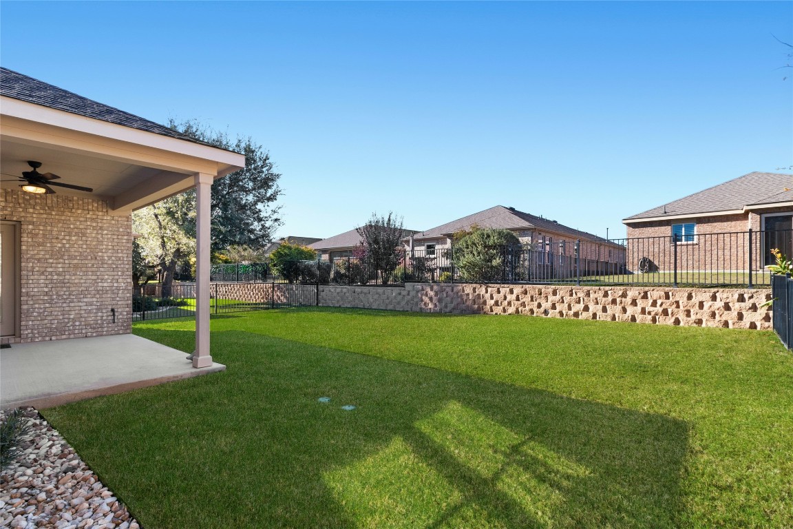 207 Longview Lane Georgetown, TX 78633 - Photo 28 of 37 a view of a house with a yard