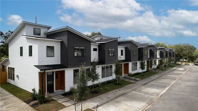 a front view of a house with yard