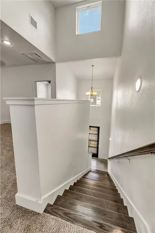 a view of a livingroom with wooden floor