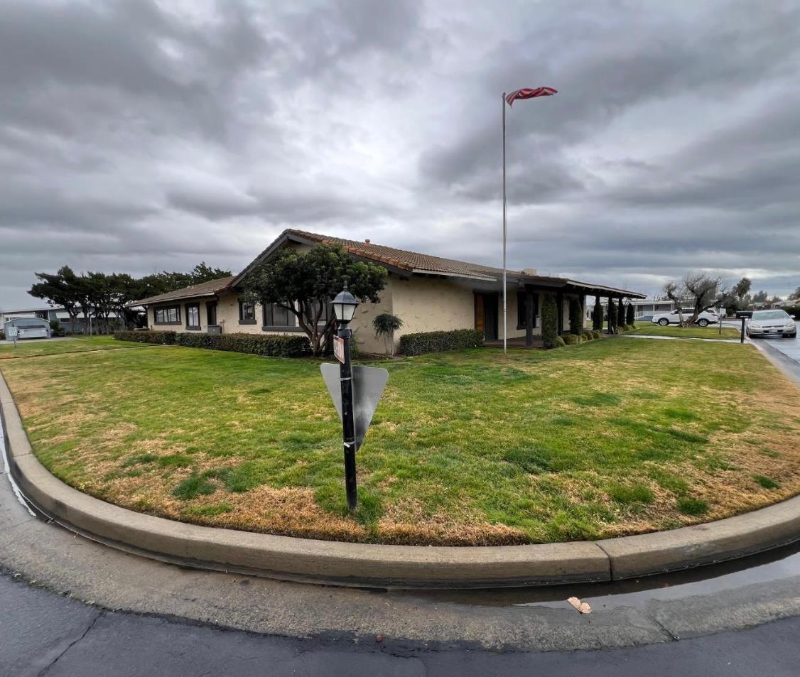 2240 Golden Oak Lane, Unit 134 Merced, CA 95341 - Photo 22 of 29 a view of a swimming pool with a yard