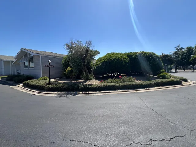 a view of a house with a street
