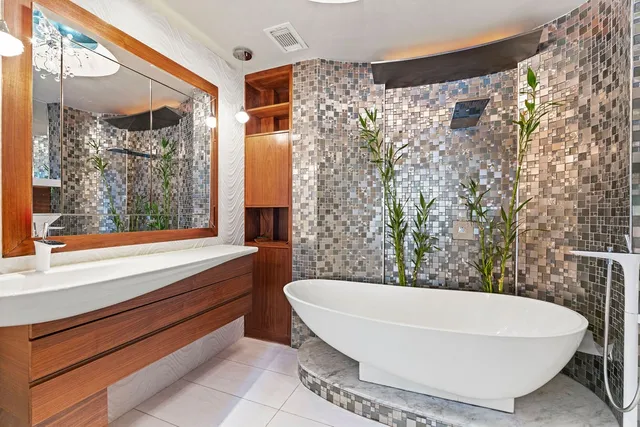 a bathroom with a toilet and a sink