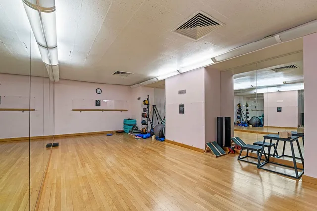 a view of a room with gym equipment