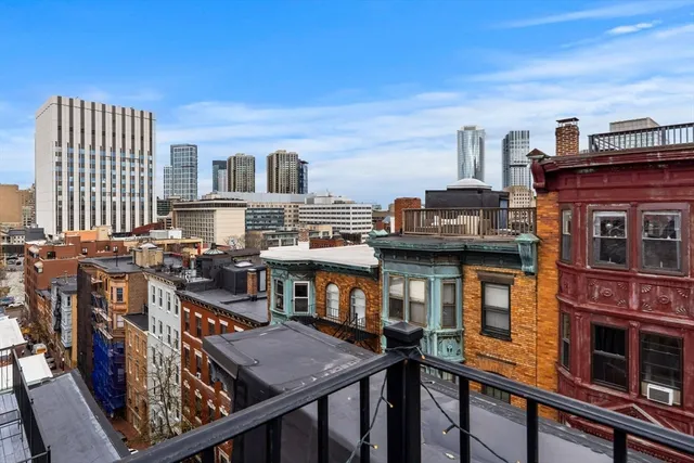 a view of a cafe with sitting area