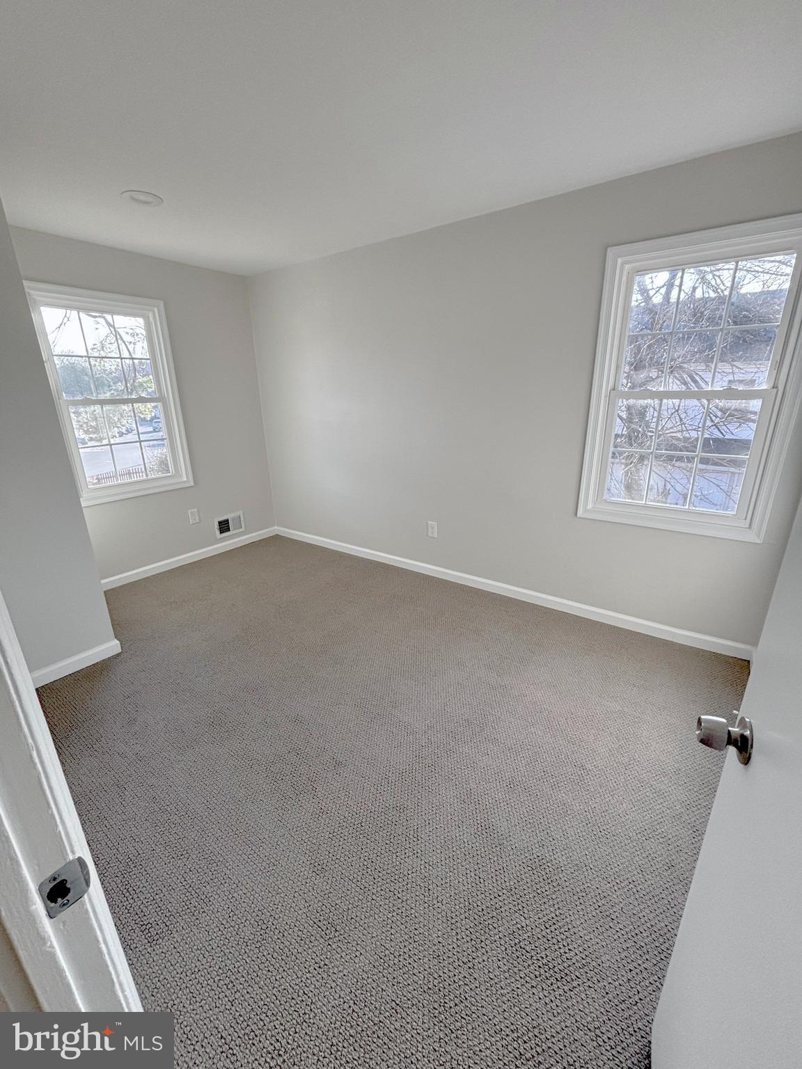 9278 Taney Road Manassas, VA 20110 - Photo 21 of 34 an empty room with windows