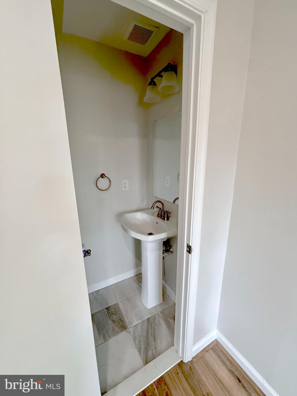 9278 Taney Road Manassas, VA 20110 - Photo 6 of 34 a bathroom with a sink and toilet