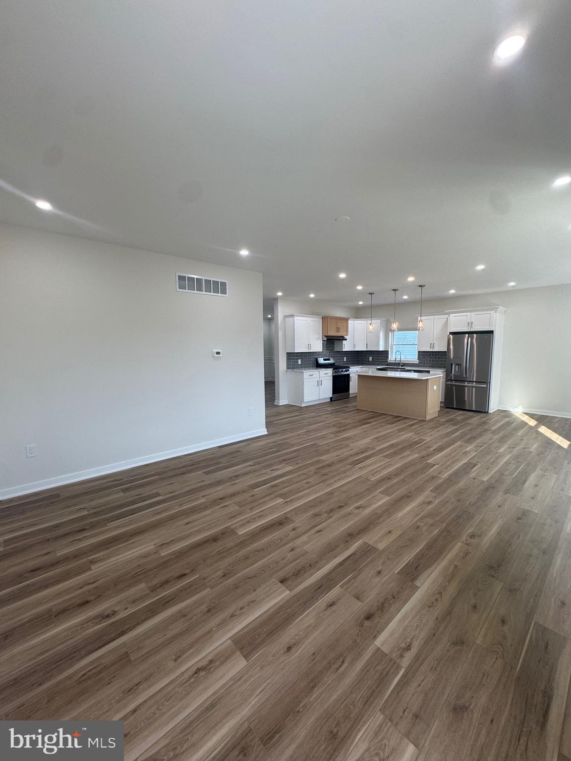 229 Ridge Avenue Blackwood, NJ 08012 - Photo 14 of 24 a view of a kitchen with a sink and a large window