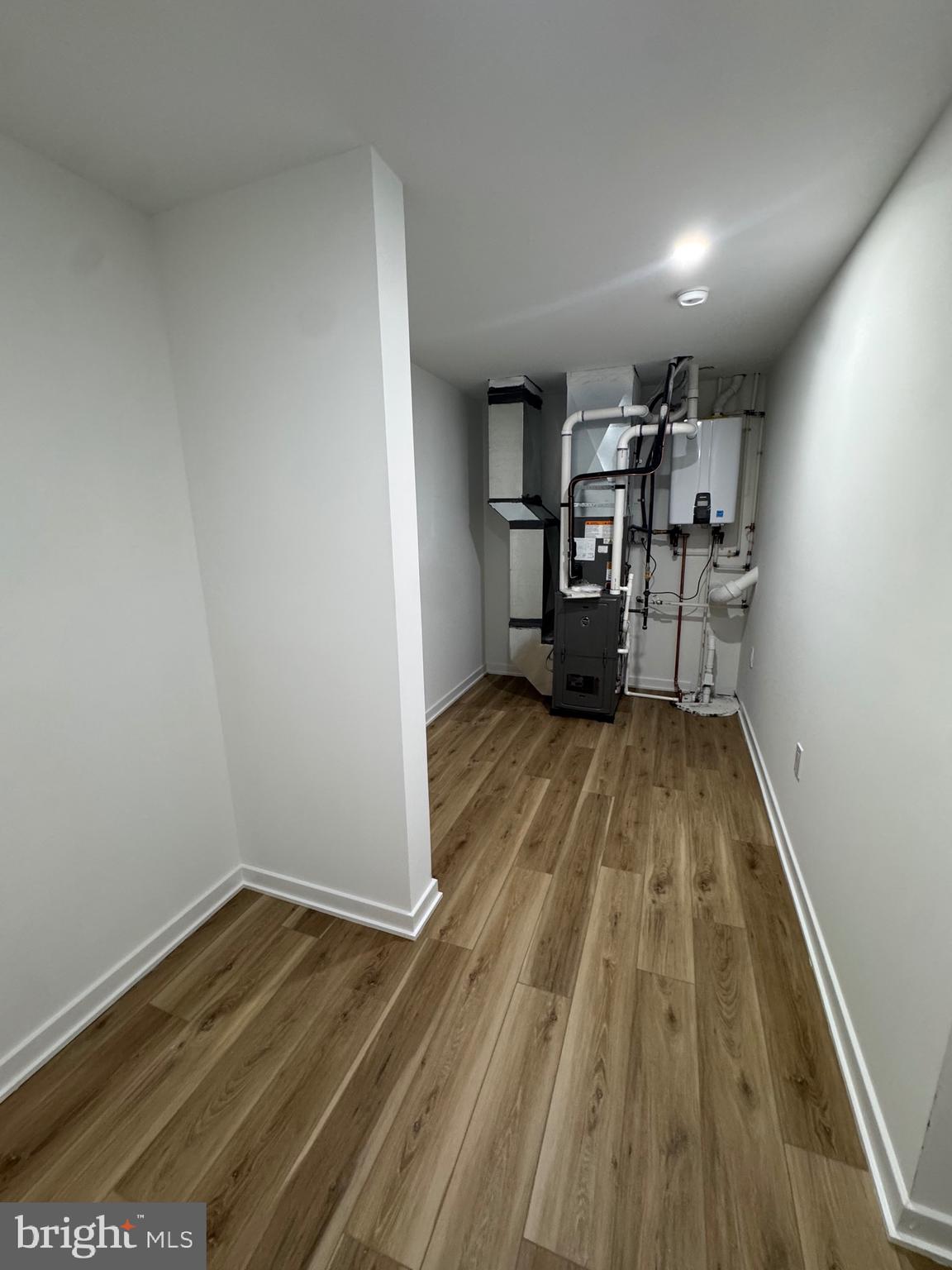 229 Ridge Avenue Blackwood, NJ 08012 - Photo 24 of 24 a view of empty room with wooden floor