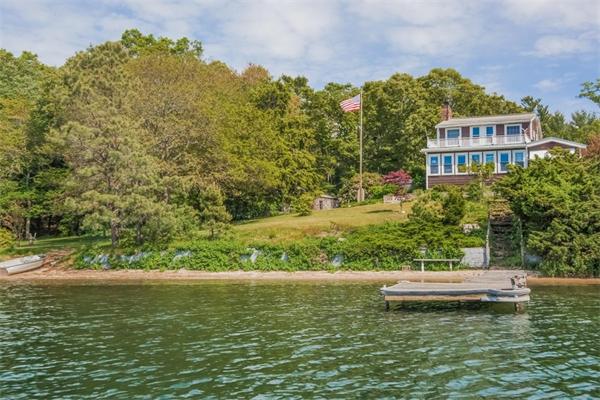 a view of a lake with a building in the background