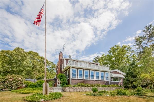 242 Barker Road Wareham, MA 02538 - Photo 15 of 30 a front view of a residential apartment building with a yard