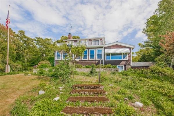 242 Barker Road Wareham, MA 02538 - Photo 22 of 30 a view of a big yard in front of a brick house with large windows