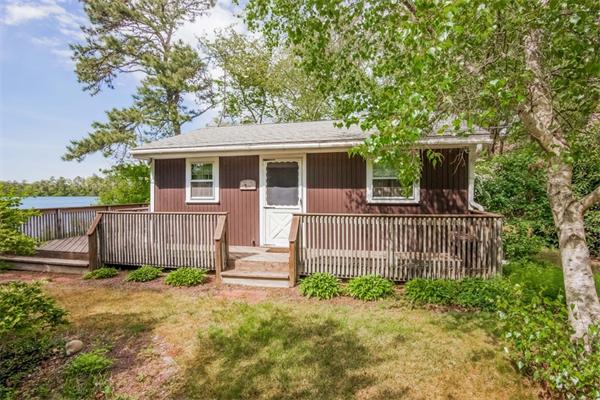 242 Barker Road Wareham, MA 02538 - Photo 26 of 30 a front view of a house with a garden