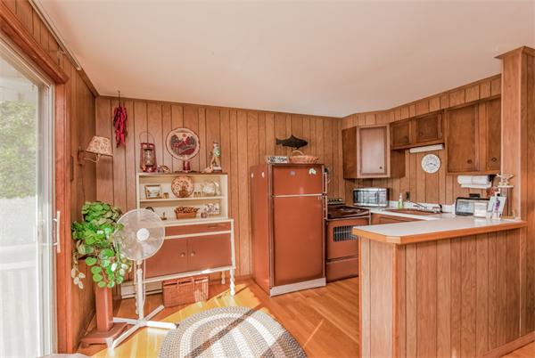 242 Barker Road Wareham, MA 02538 - Photo 27 of 30 a kitchen with stainless steel appliances granite countertop a refrigerator and a stove