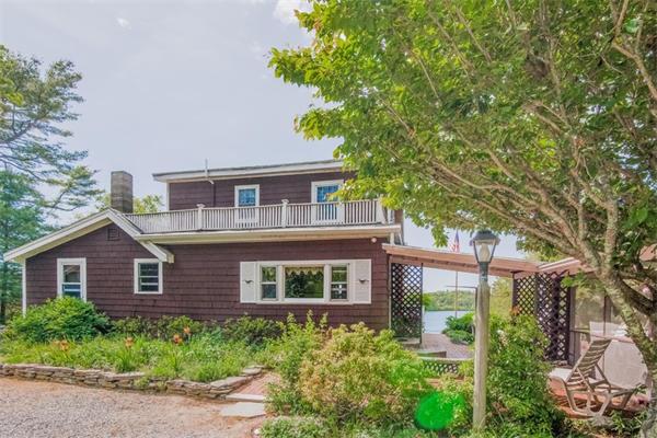242 Barker Road Wareham, MA 02538 - Photo 3 of 30 a front view of a house with a yard