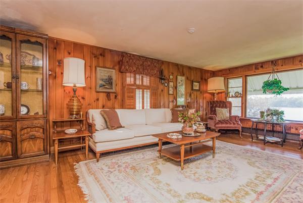 242 Barker Road Wareham, MA 02538 - Photo 4 of 30 a living room with furniture a large window and wooden floor