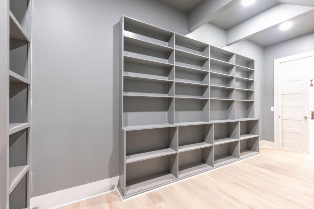 2001 Epperson Road Canton, GA 30115 - Photo 23 of 76 a view of an empty room with empty shelves