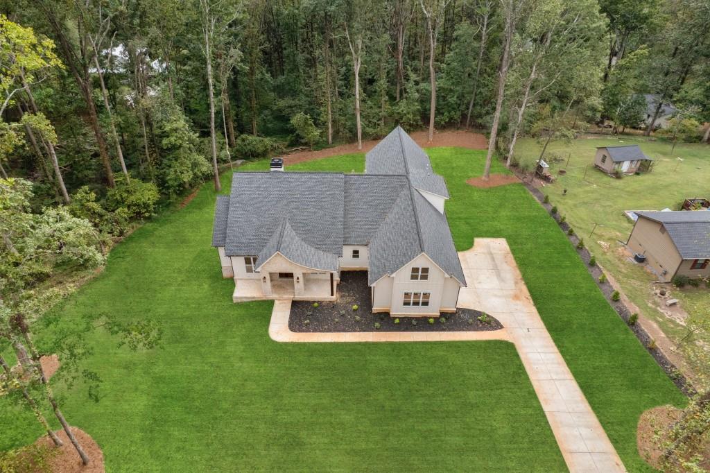 2001 Epperson Road Canton, GA 30115 - Photo 3 of 76 an aerial view of a house with swimming pool garden and patio