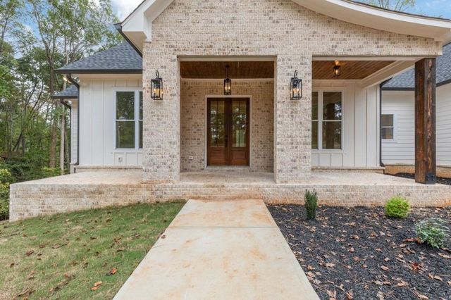 a view of a room with window and wooden floor