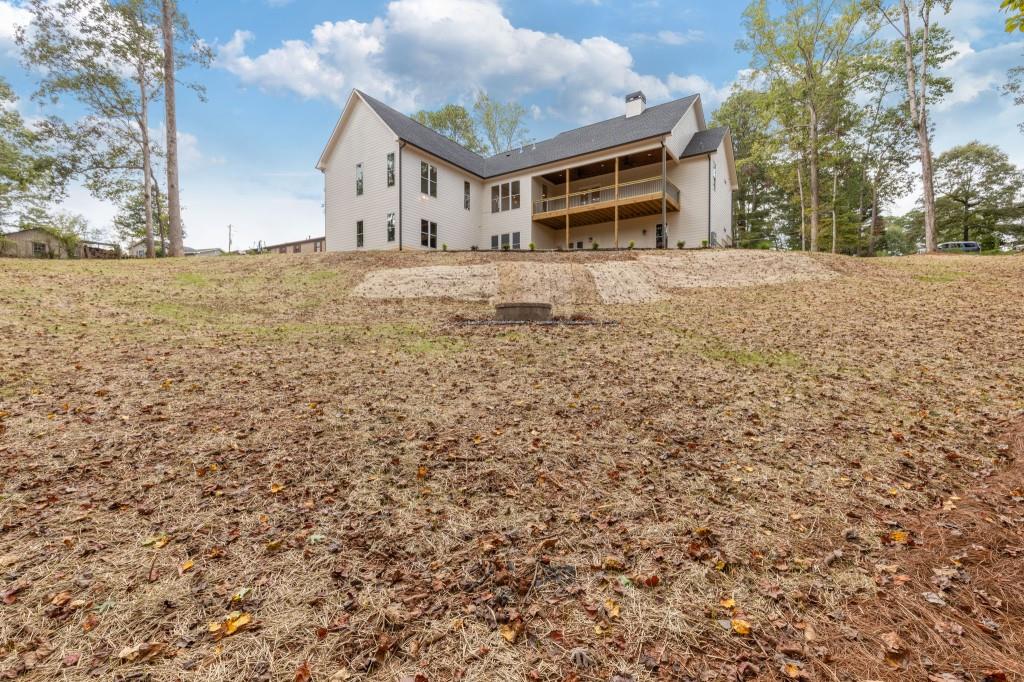2001 Epperson Road Canton, GA 30115 - Photo 55 of 76 a front view of a house with a yard