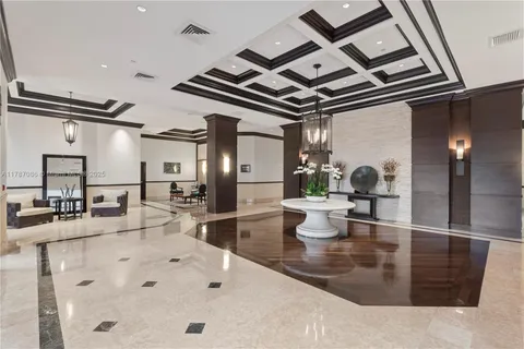 a view of a swimming pool with a garden and plants