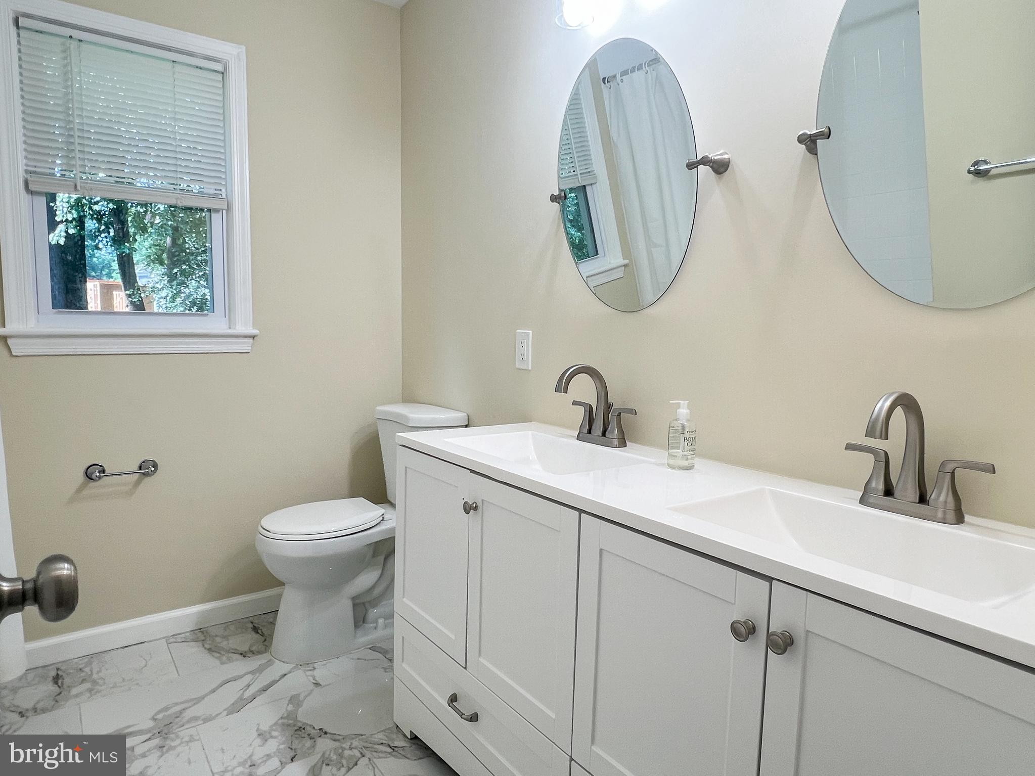 405 Wolftrap Road Southeast Vienna, VA 22180 - Photo 14 of 20 Update hall bath with double vanity