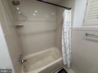 8613 Leonard Drive Silver Spring, MD 20910 - Photo 18 of 27 a bathroom with a bathtub and shower
