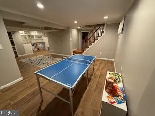 a view of entryway with wooden floor