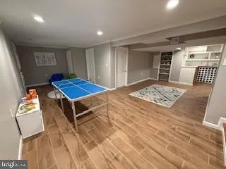 a bedroom with a bed and a table