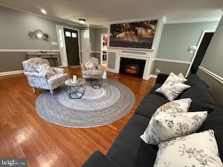 8613 Leonard Drive Silver Spring, MD 20910 - Photo 2 of 27 a living room with furniture and a fireplace