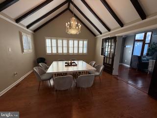 8613 Leonard Drive Silver Spring, MD 20910 - Photo 5 of 27 a view of a dining room with furniture and wooden floor