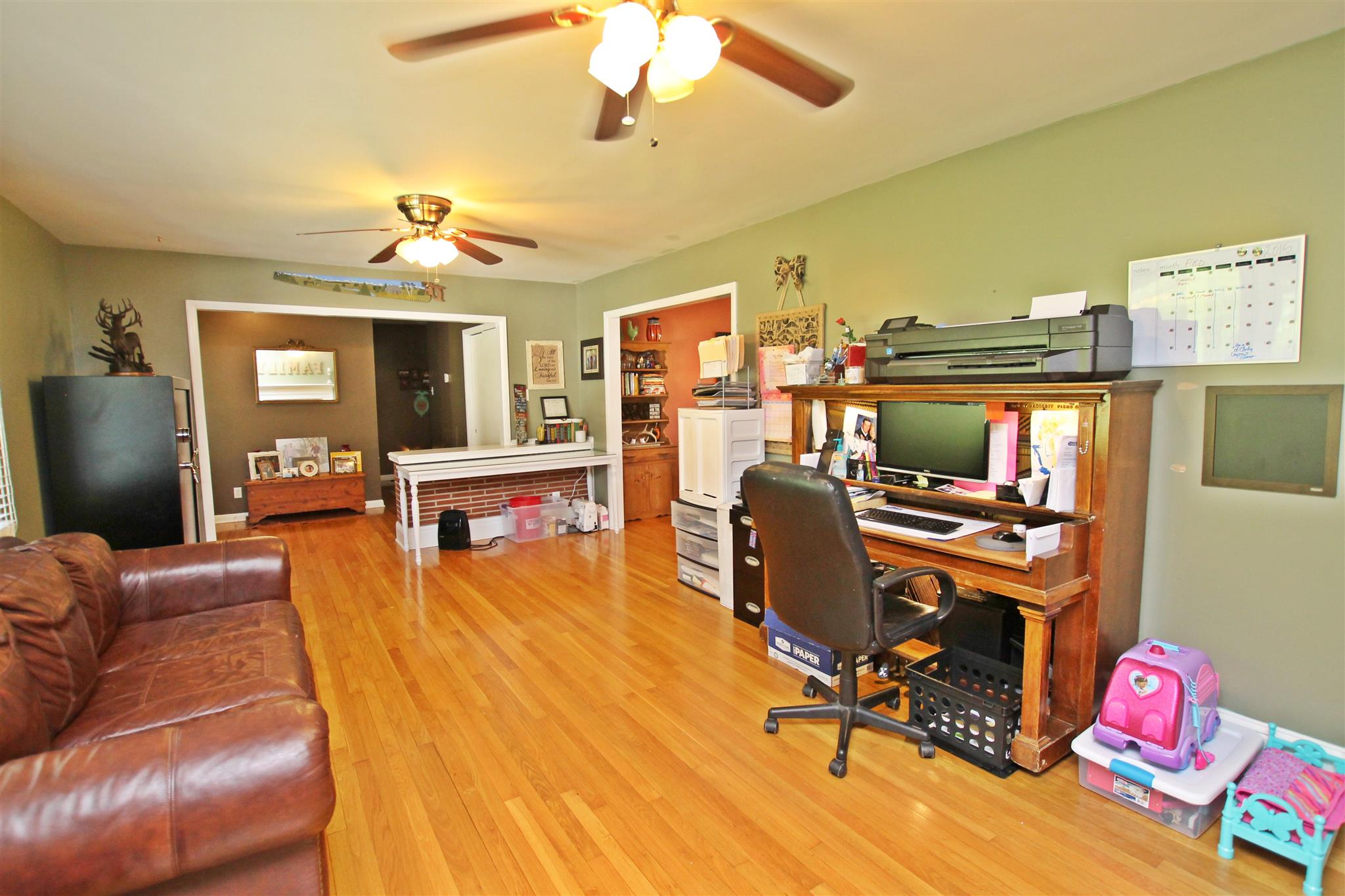 4532 Corbin Sneed Road Springfield, TN 37172 - Photo 6 of 30 a view of a livingroom with workspace and a couch
