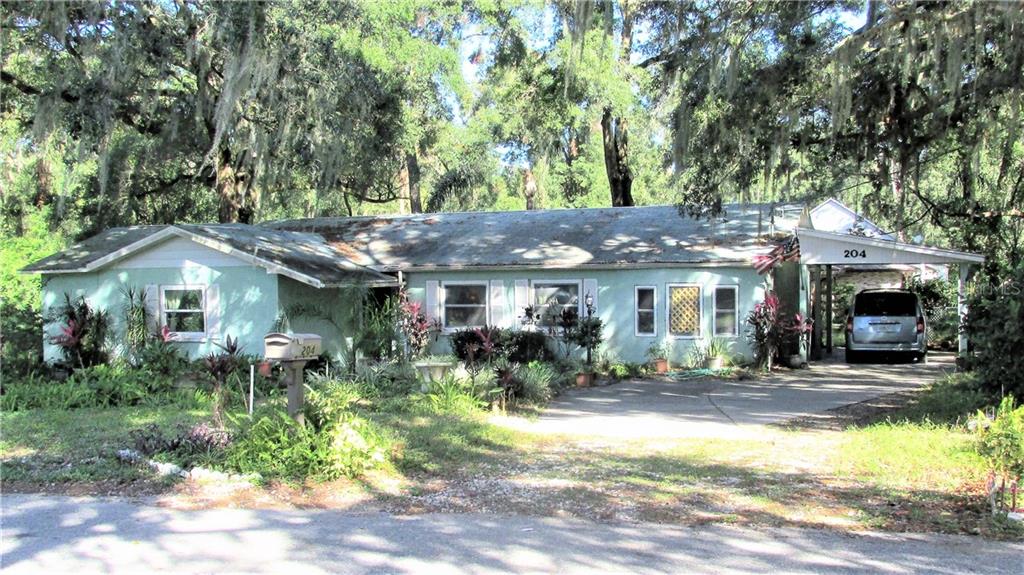 204 Wense Avenue Seffner, FL 33584 - Photo 1 of 1 a front view of a house with a yard