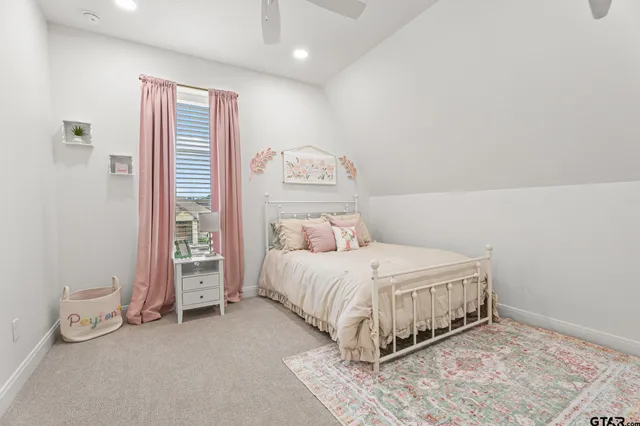 a bedroom with a bed and a cabinets